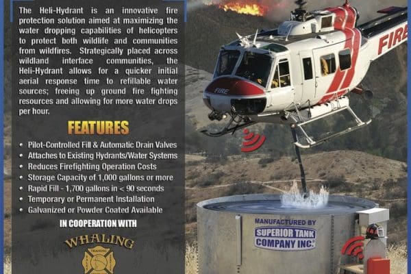 A firefighting helicopter fills its tank at a Heli-Hydrant water station in a rural area, with informational text and contact details about the fire protection storage product. A firefighting helicopter fills its tank at a Heli-Hydrant water station in a rural area, with informational text and contact details about the fire protection storage product.
